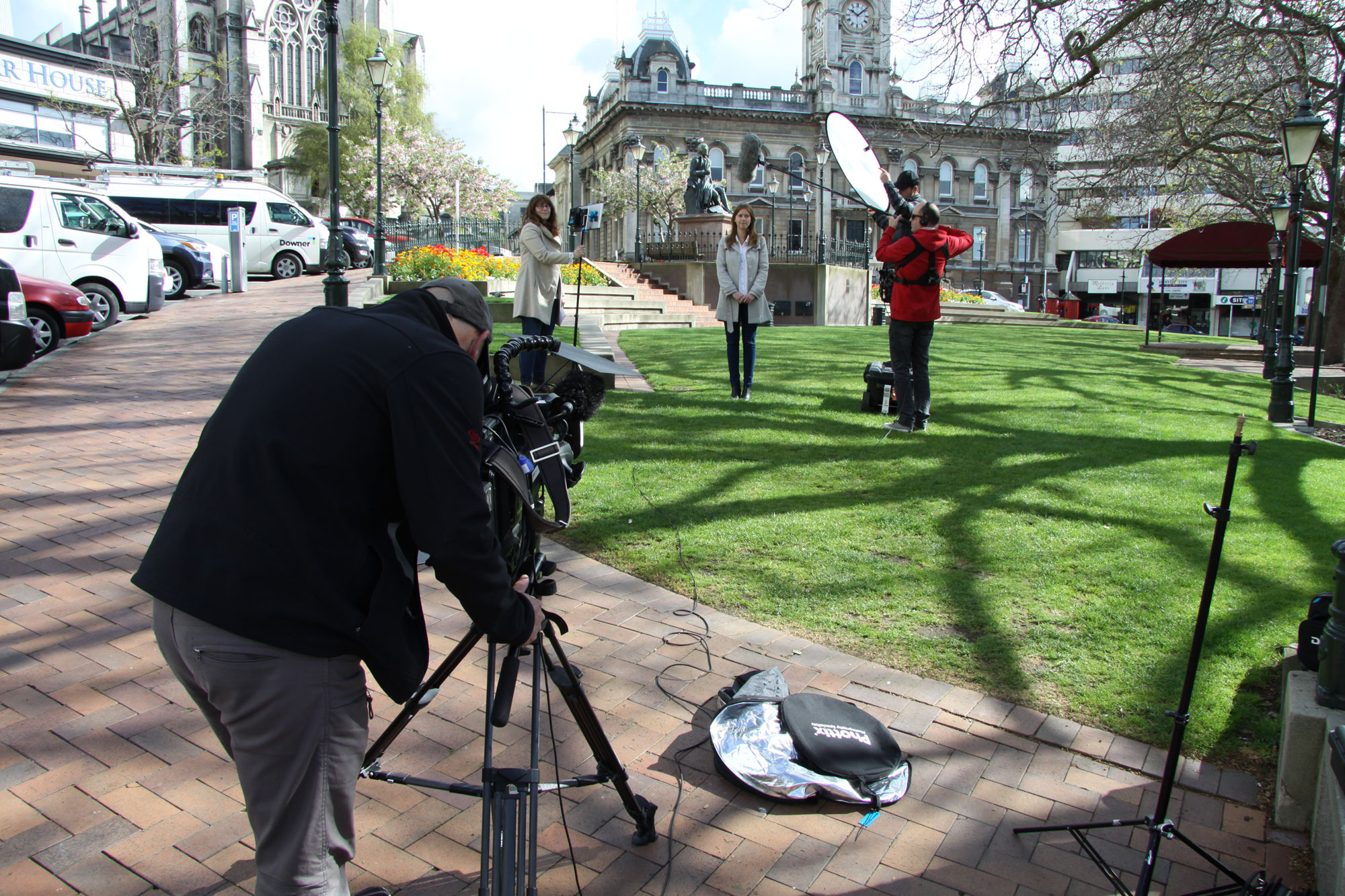 filming on the lawn outside parliament